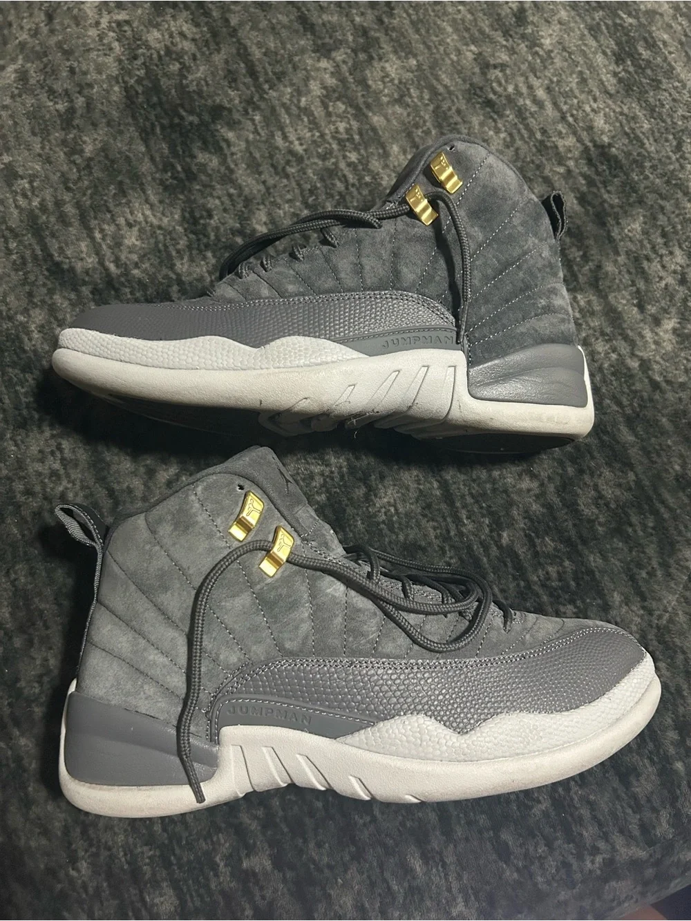 Jordan 12s Retro High Top Sneakers in Gray with Gold Accents
